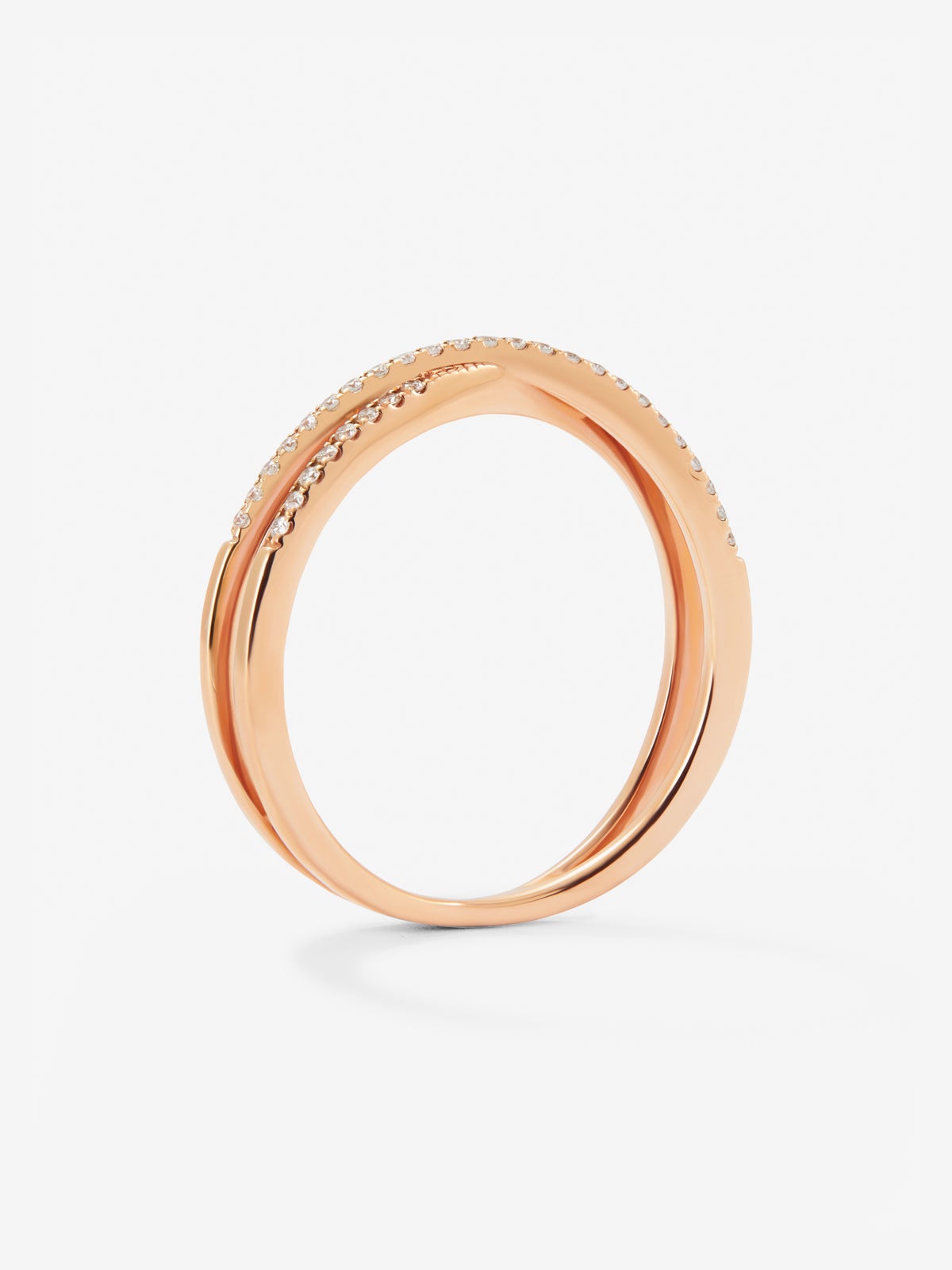 Anillo cruzado de oro rosa de 18K con 40 diamantes en talla brillante con un total de 0,12 cts