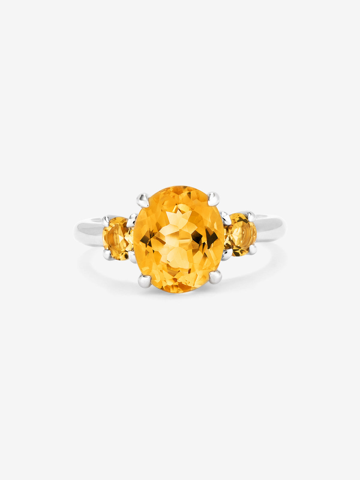 Anillo tresillo de plata 925 con 3 cuarzos citrinos en talla oval con un total de 3,14 cts