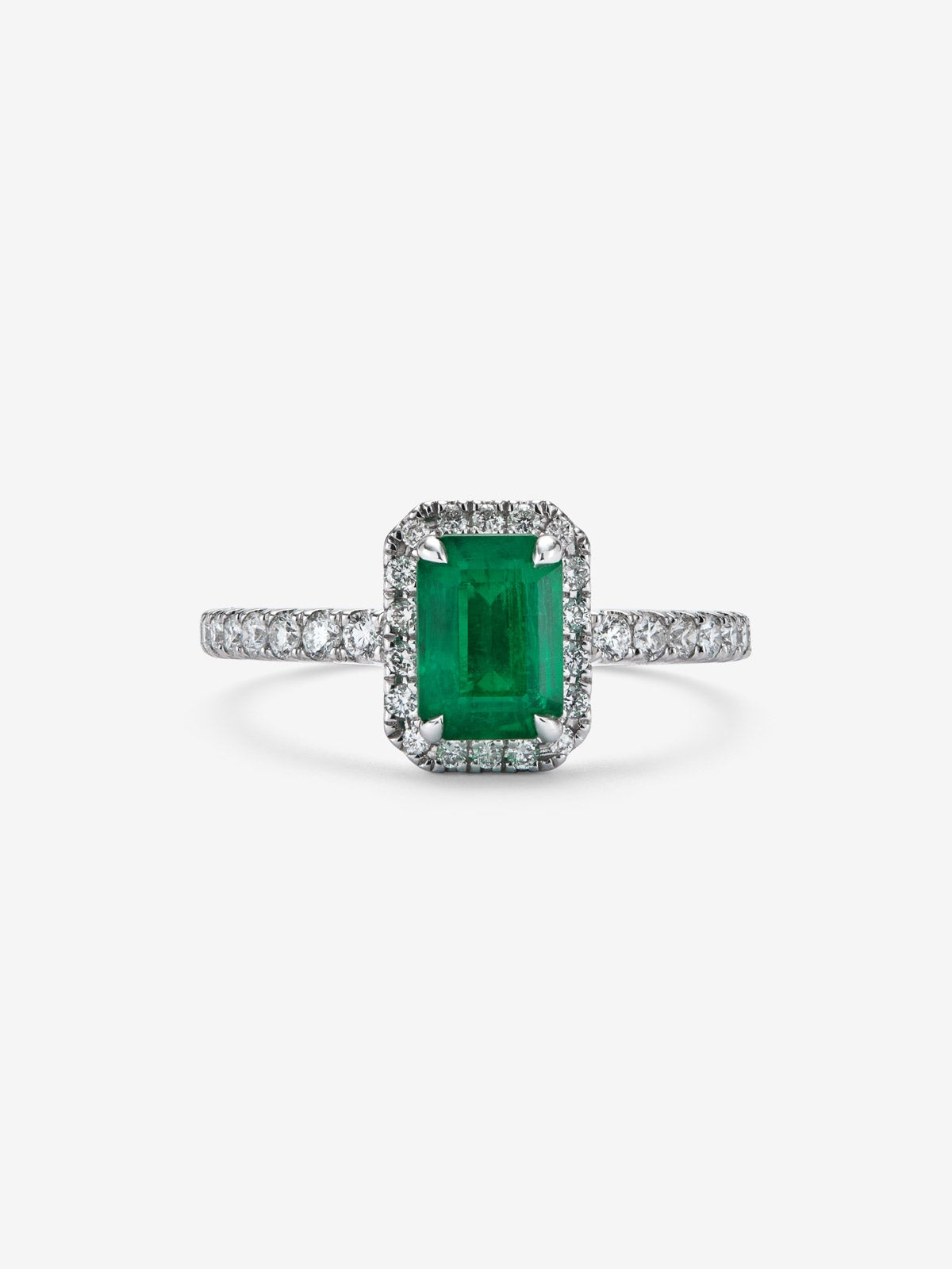 Anillo de oro blanco 18K con esmeralda