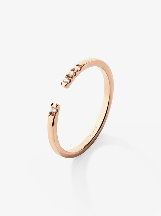 Anillo abierto de oro rosa de 18K con 4 diamantes en talla brillante con un total de 0,05 cts