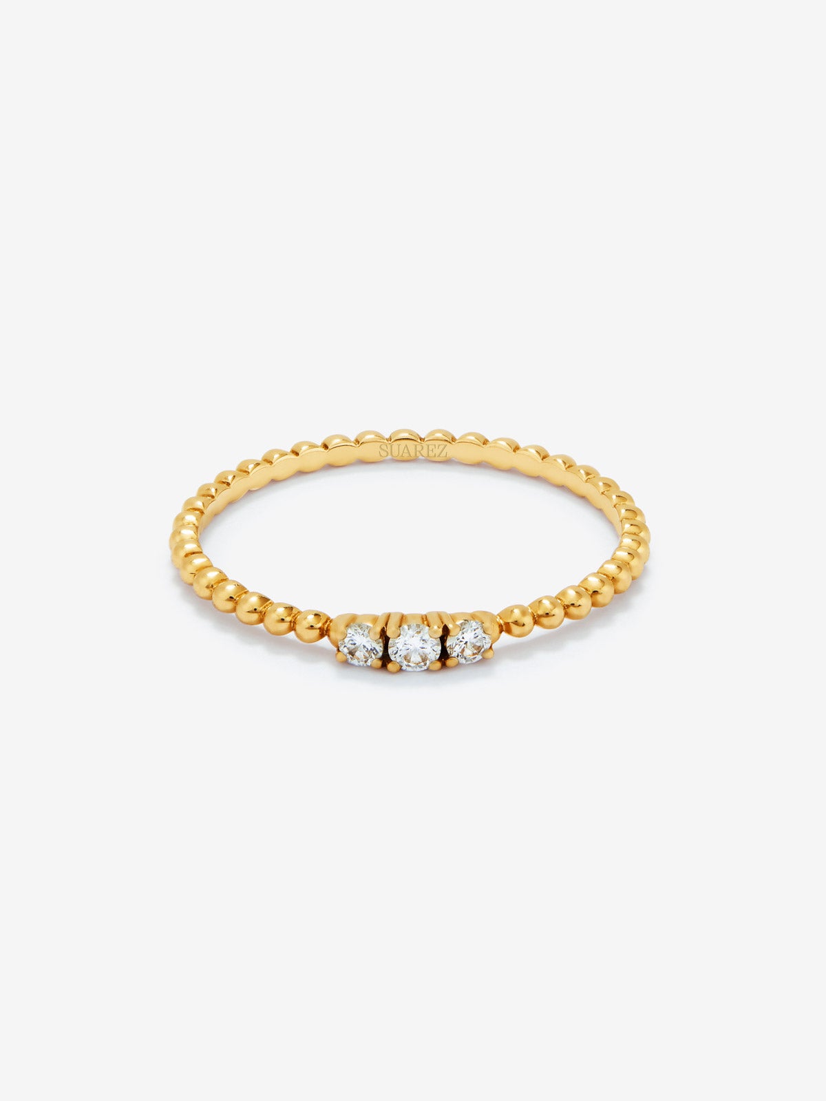 Anillo tresillo de oro amarillo de 18K con 3 diamantes en talla brillante con un total de 0,08 cts