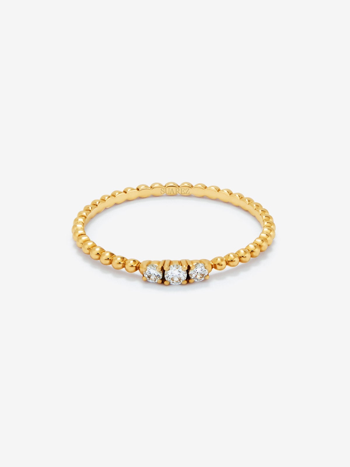 Anillo tresillo de oro amarillo de 18K con 3 diamantes en talla brillante con un total de 0,08 cts