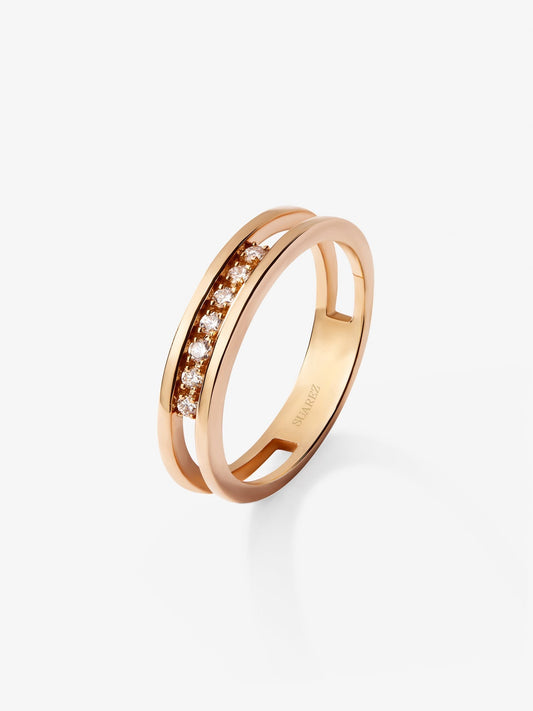 Anillo doble de oro rosa de 18K con 7 diamantes en talla brillante con un total de 0,1 cts