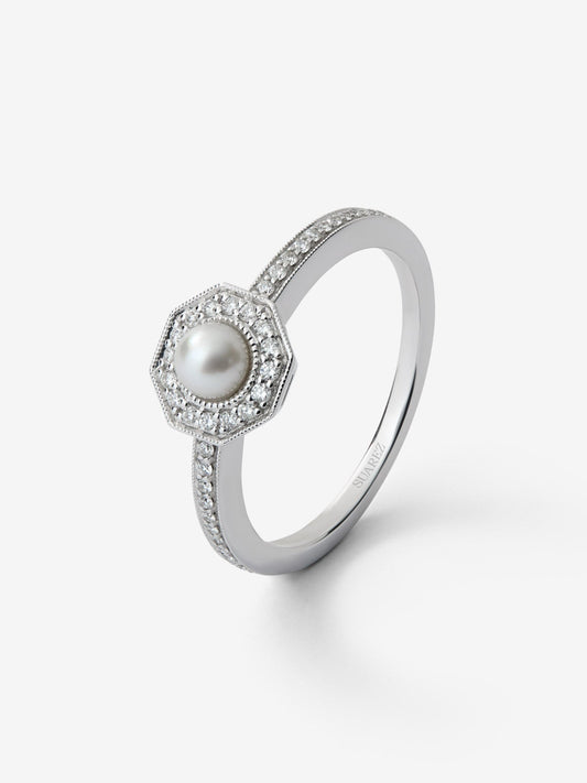 Anillo de oro blanco de 18K con perla australiana y 40 diamantes en talla brillante con un total de 0,14 cts