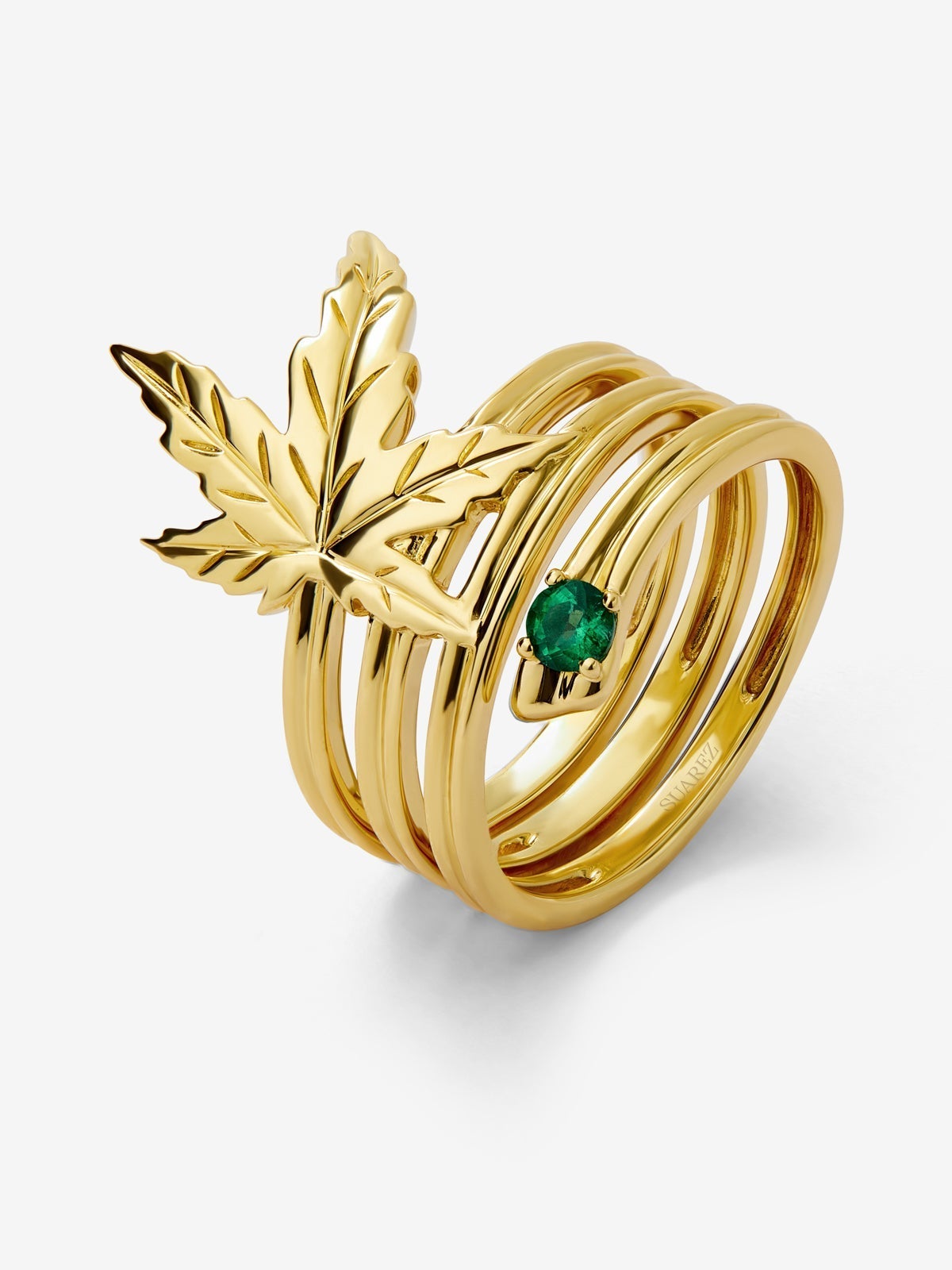 Anillo de oro amarillo de 18K con esmeralda en talla brillante de 0,11 cts y forma de hoja de arce