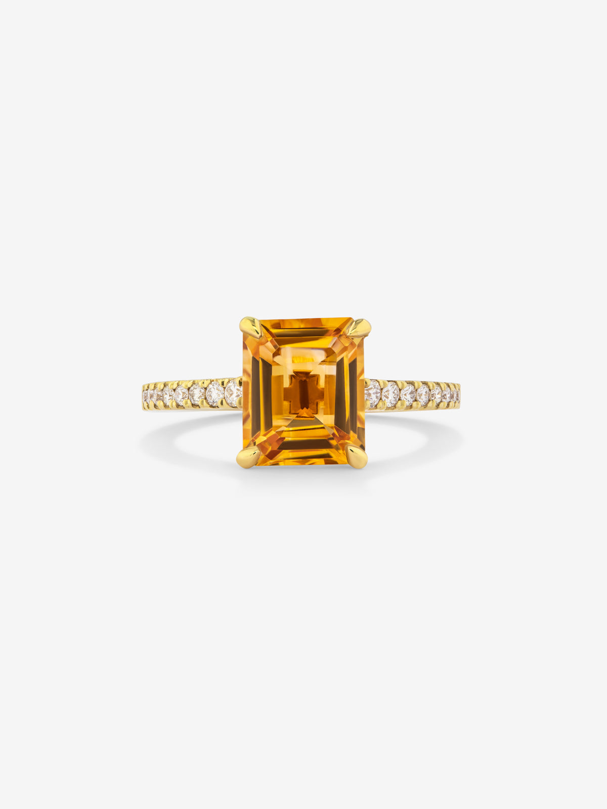 18K yellow gold ring with radiant cut citrine quartz of 1.2 cts and 18 brilliant cut diamonds with a total of 0.18 cts