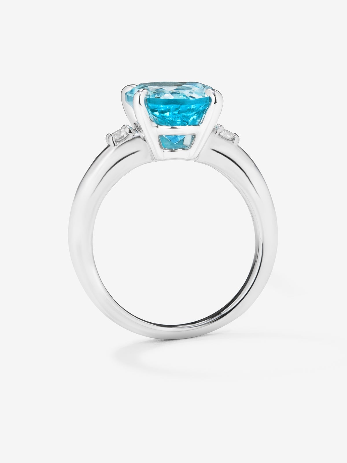 Anillo tresillo de plata 925 con topacio azul Sky y diamantes