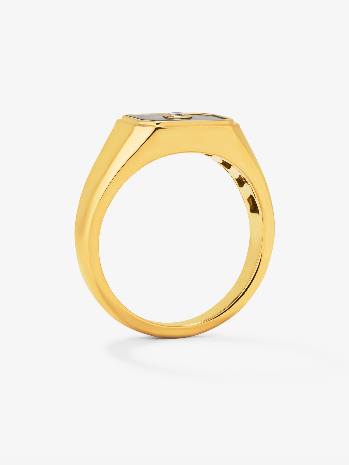 Anillo de sello mediano en oro amarillo de 18k con ónix negro de 0.98 ct y diamante de 0.03 ct