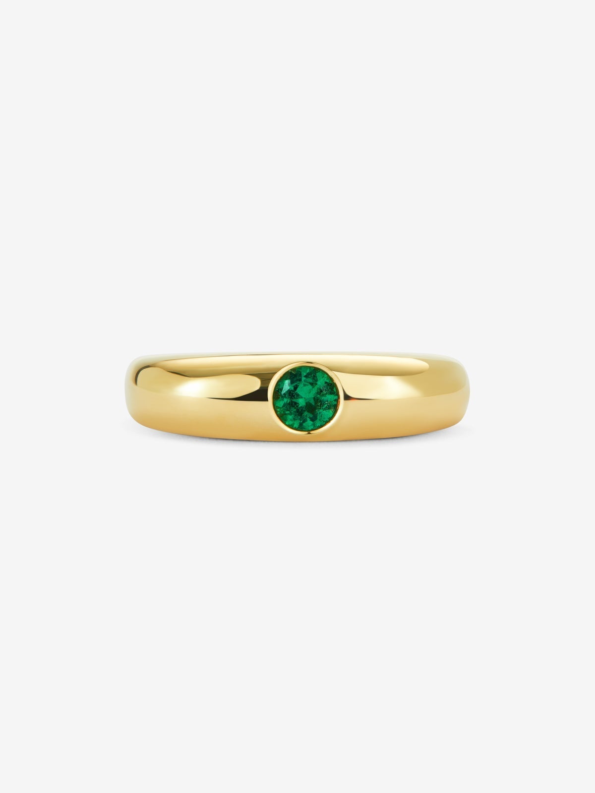 Anillo de oro amarillo de 18K con esmeralda en talla brillante de 0,25 cts