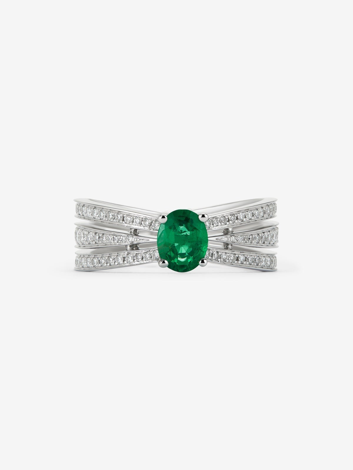 Anillo multibrazo de oro blanco de 18K con esmeralda en talla oval de 0,63 cts y diamantes en talla brillante con un total de 0,43 cts