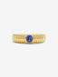 Anillo gallonado de oro amarillo de 18K con zafiro en talla oval
