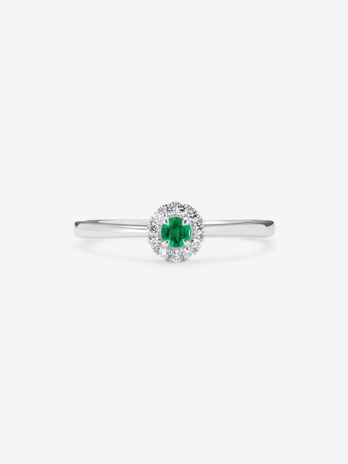 Anillo de oro blanco de 18K con esmeralda verde en talla brillante de 0,44 cts y diamantes en talla brillante con un total de 0,10 cts