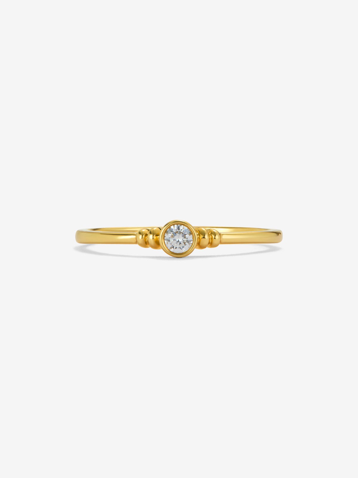 Anillo solitario de oro amarillo de 18K con diamante en talla brillante de 0,07 cts