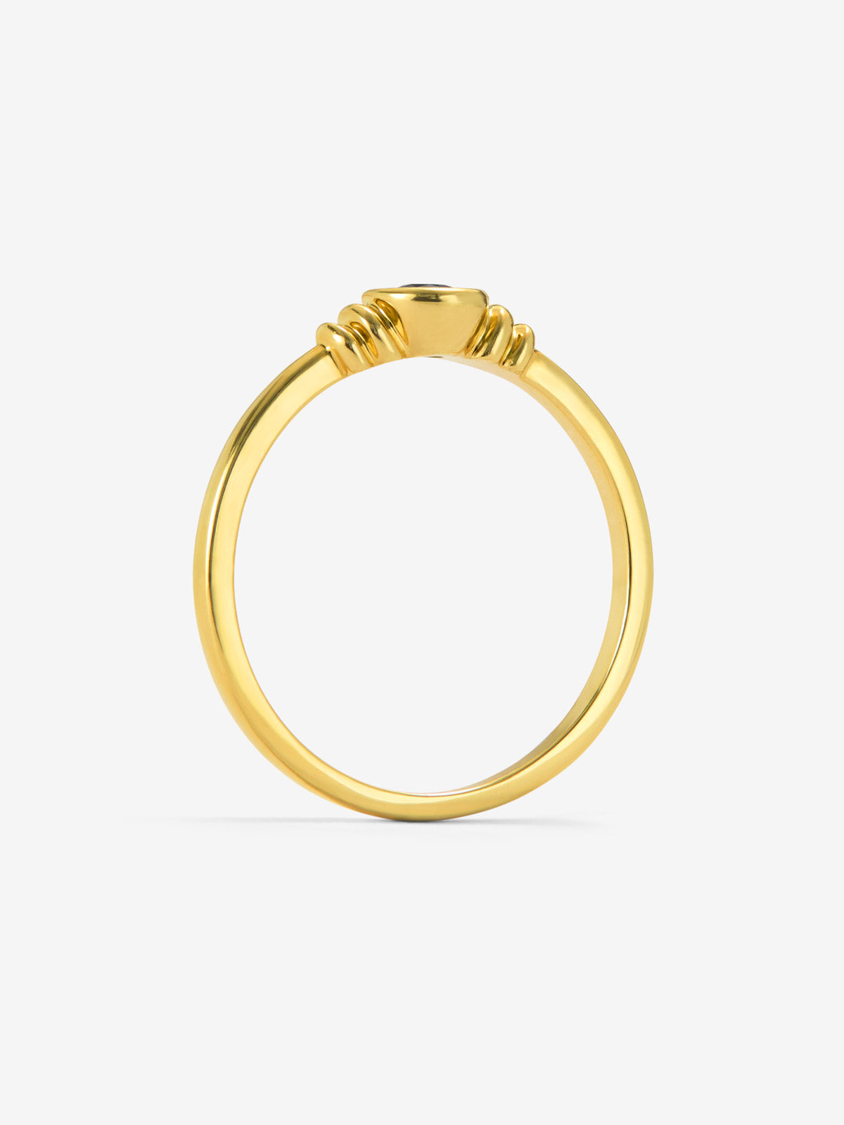 Anillo de oro amarillo de 18K con zafiro azul en talla brillante de 0,15 cts