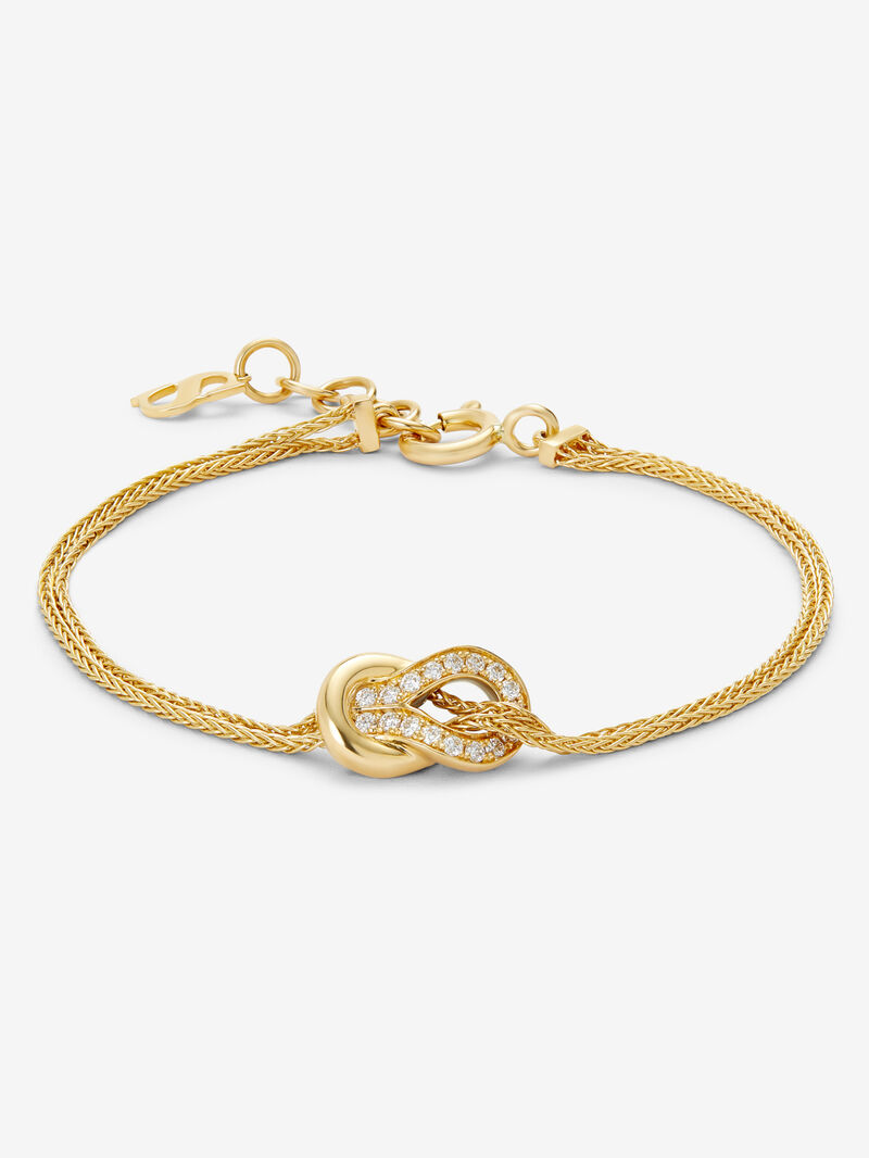 18K yellow gold bracelet with 17 brilliant-cut diamonds with a total of 0.15 cts and a knot shape image number 0