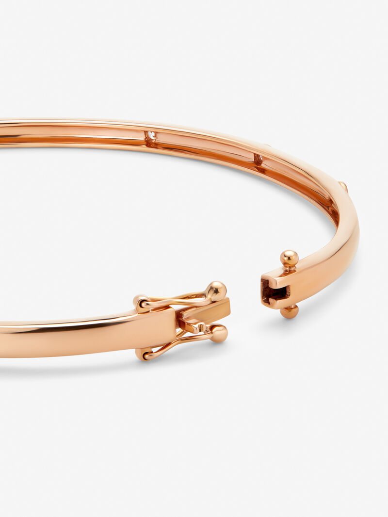 Thin rigid bracelet in 18K rose gold with diamonds. image number 4