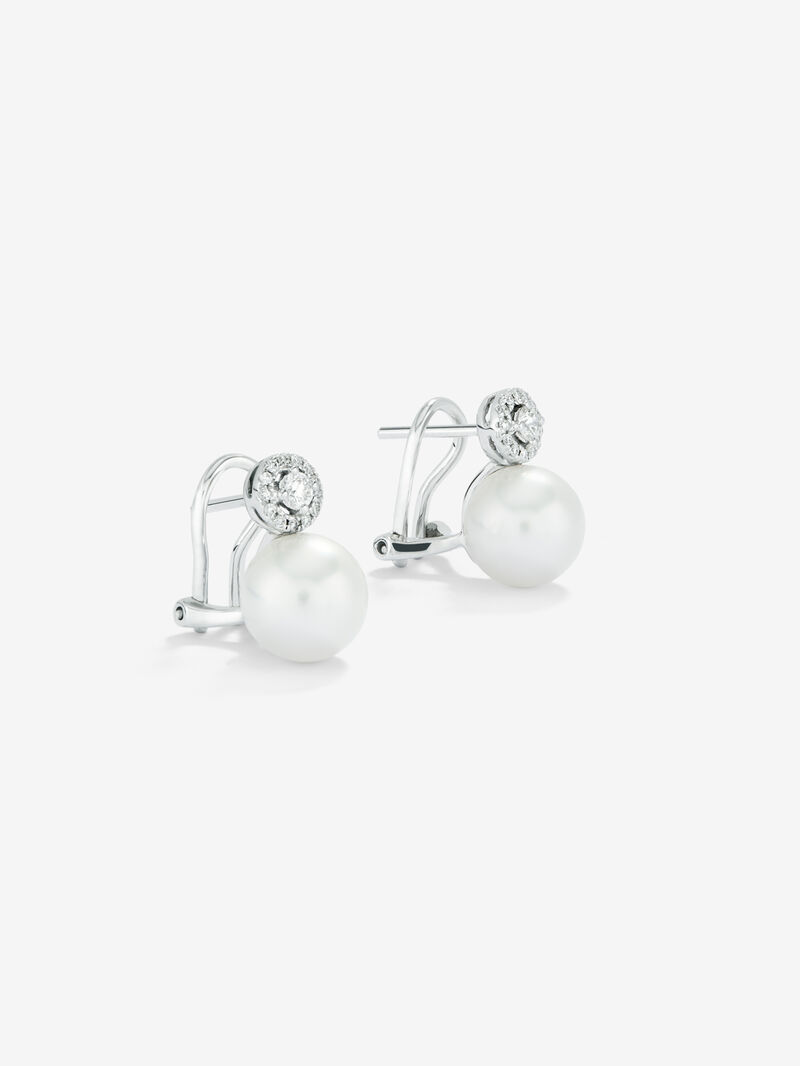 18k white gold earring with 9 mm Australian pearl pendant and diamond with omega closure. image number 2