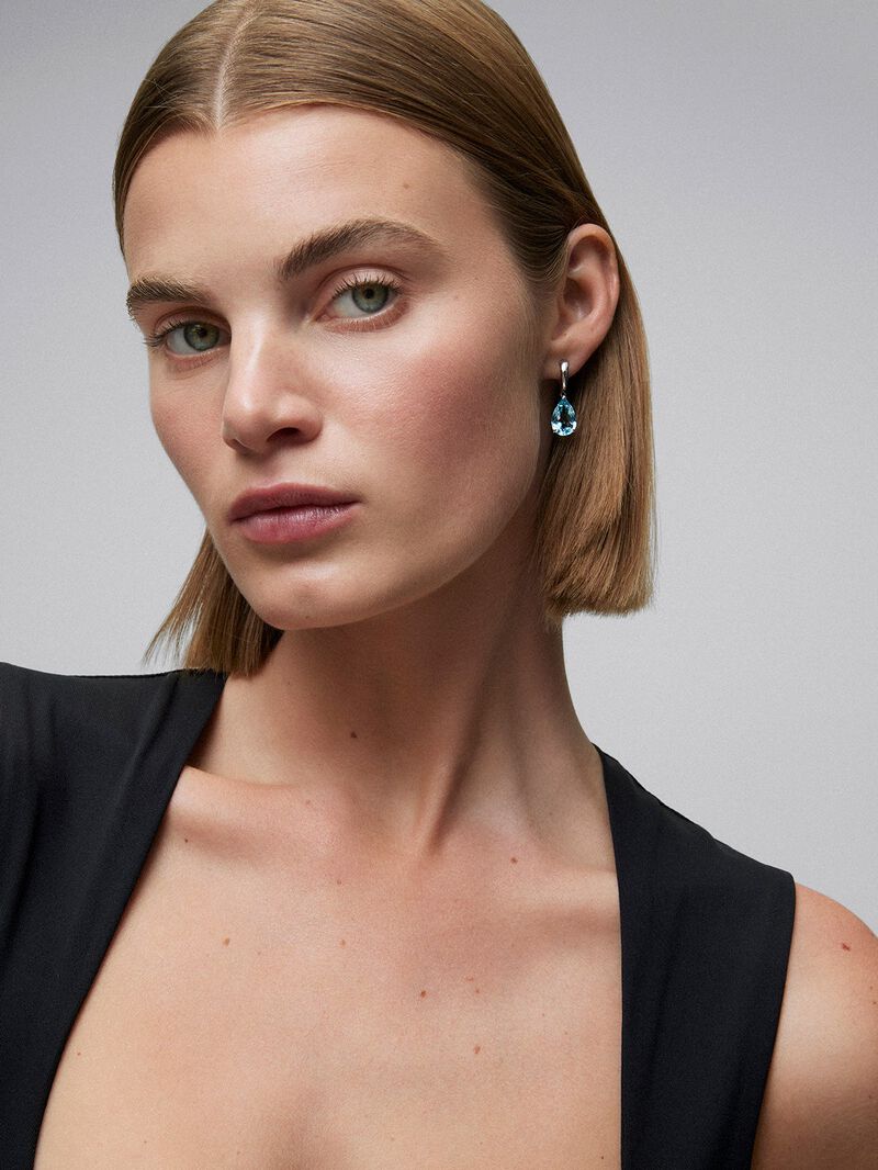 18K yellow gold hoop earrings with topaz pendant. image number 0