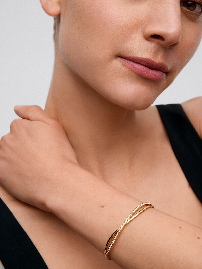 Rigid yellow gold bracelet of 18k with white diamonds in 0.74 cts image number 3