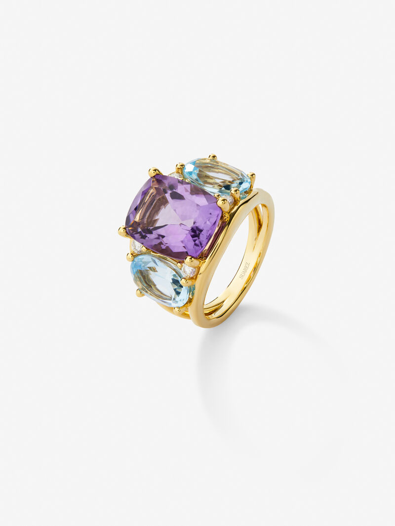 18kt yellow gold ring with diamonds, Sky and amethyst topacios image number 0