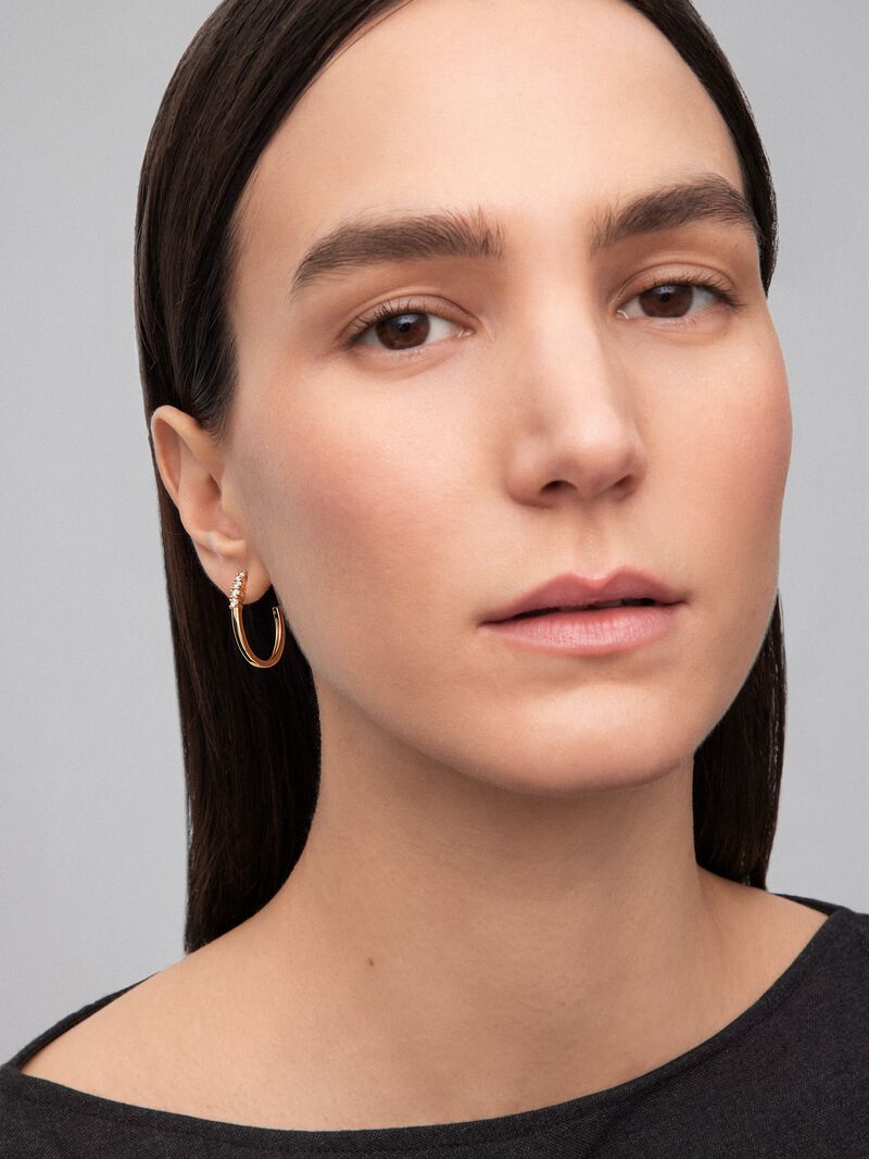 18k yellow gold hoop earrings with 0.5 cts diamonds. image number 1