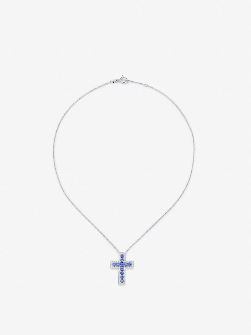18kt white gold cross pendant with diamonds and blue sapphires. image number 1