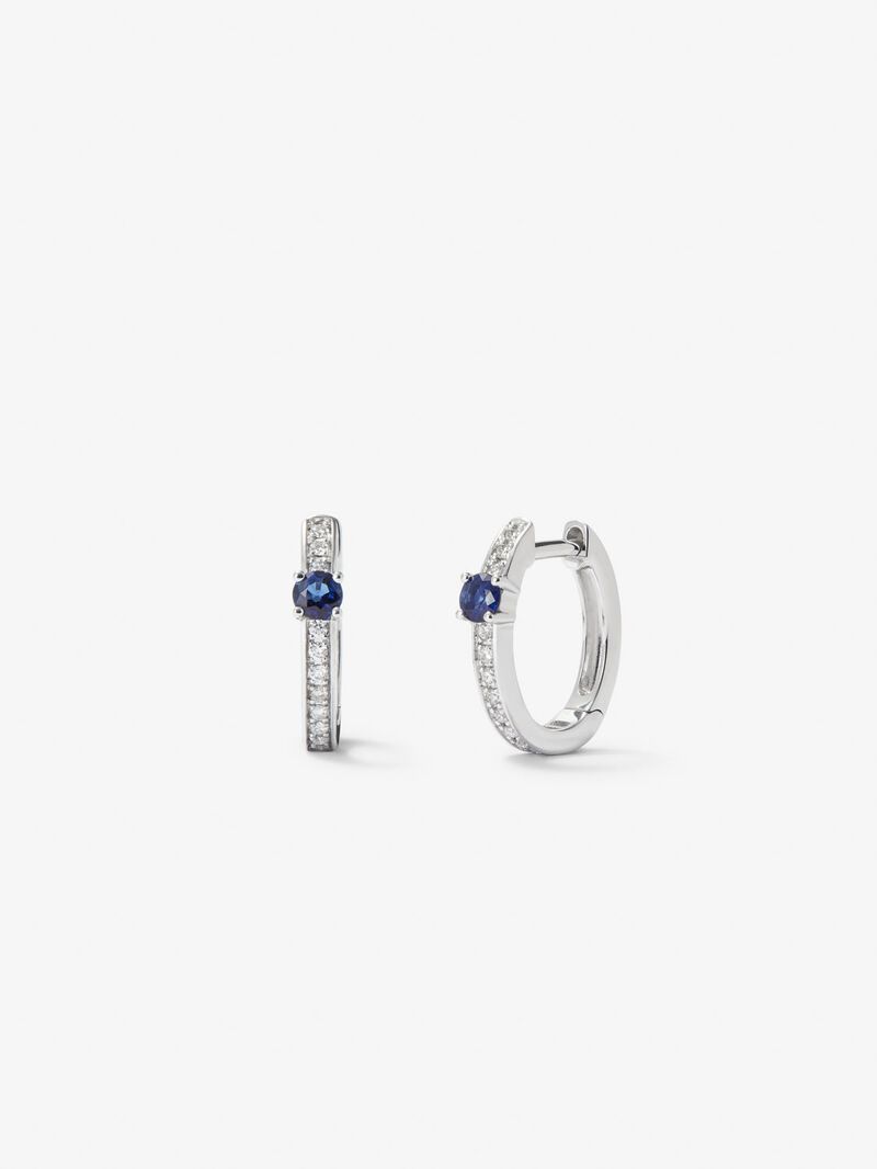 18K white gold hoop earrings with 2 brilliant-cut blue sapphires with a total of 0.15 cts and 26 brilliant-cut diamonds with a total of 0.1 cts image number 0