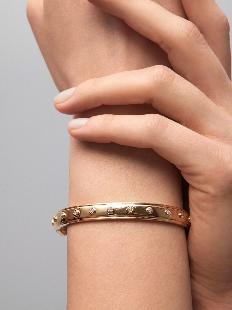 Rigid 18K yellow gold bracelet with 11 brilliant-cut diamonds with a total of 0.36 cts image number 3