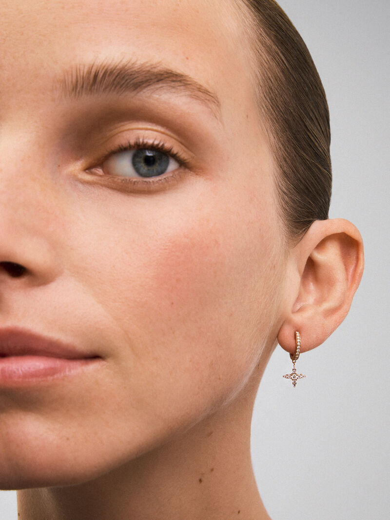 Individual hoop earring with hanging star in 18K rose gold with diamonds. image number 3