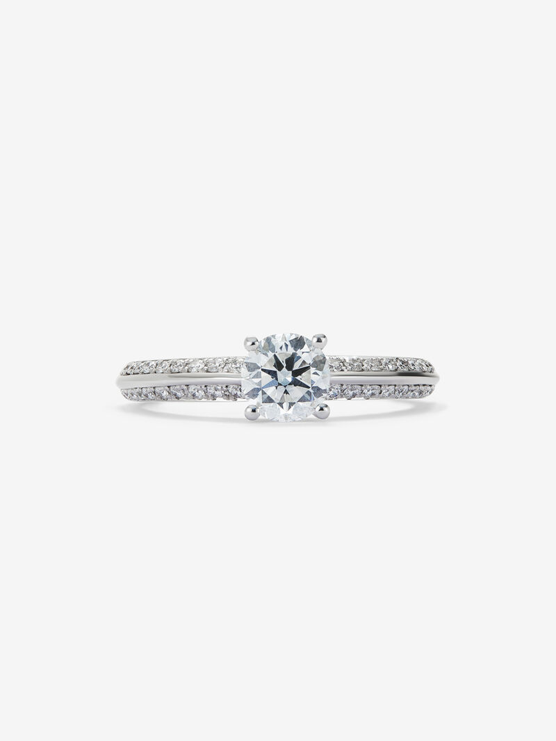 Solitaire ring in 18K white gold with a 0.70-carat central diamond and additional brilliant-cut diamonds totaling 0.25 cts image number 2