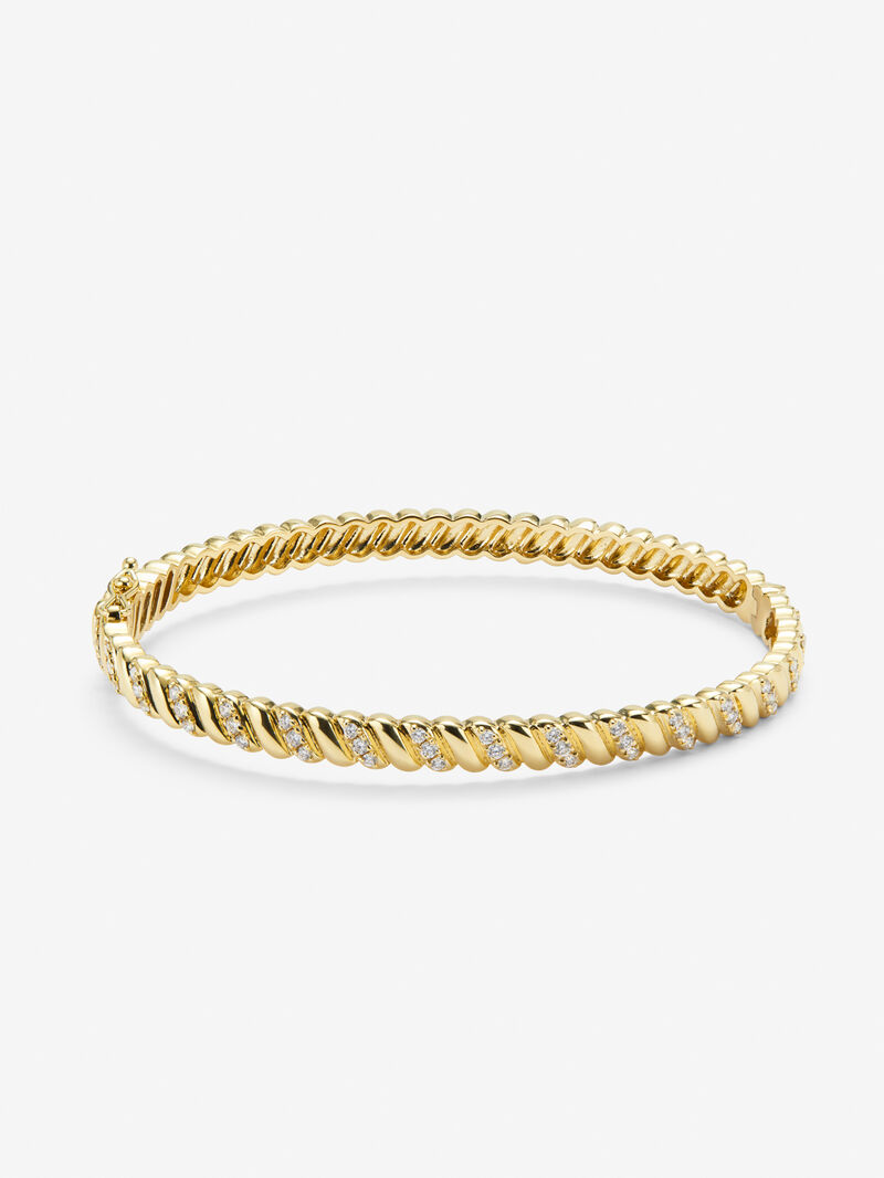 Rigid yellow gold bracelet of 18k with white diamonds in 0.58 cts image number 0