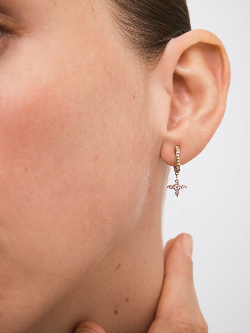 Individual hoop earring with hanging star in 18K rose gold with diamonds. image number 1
