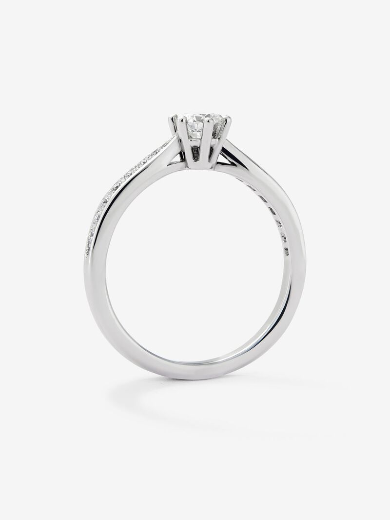 Solitaire ring in 18K white gold with a central 0.30-carat brilliant-cut diamond and additional diamonds totaling 0.15 cts image number 4
