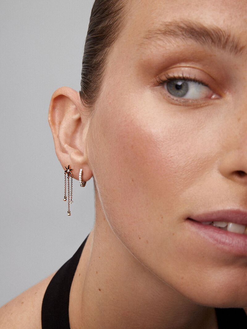 Single long drop earring of 18K rose gold star with diamonds. image number 1