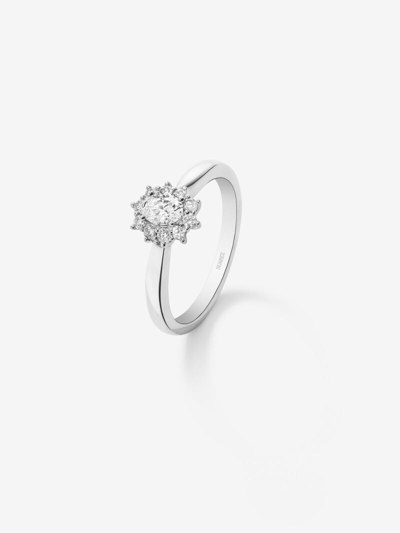 18K white gold ring with a central oval-cut white diamond of 0.3 cts and a border of 10 brilliant-cut diamonds with a total of 0.18 cts image number 0