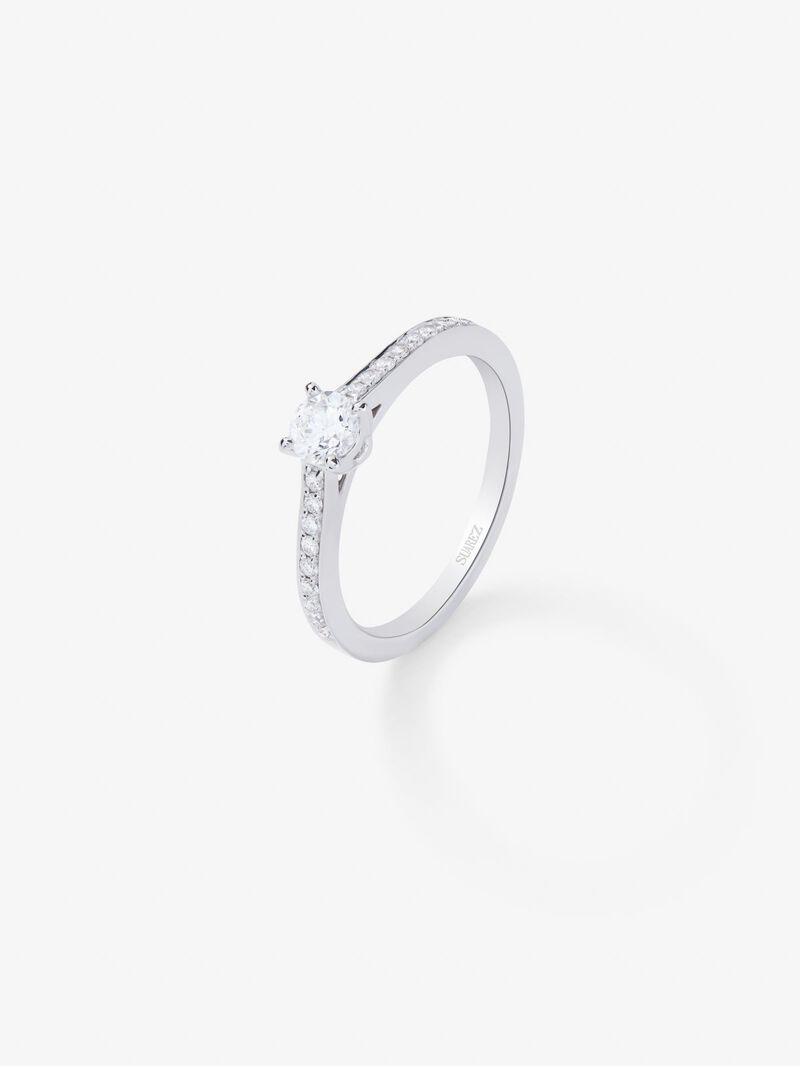 18K white gold solitaire ring with central brilliant-cut diamond of 0.3 cts and arm of 18 brilliant-cut diamonds with a total of 0.13 cts image number 0