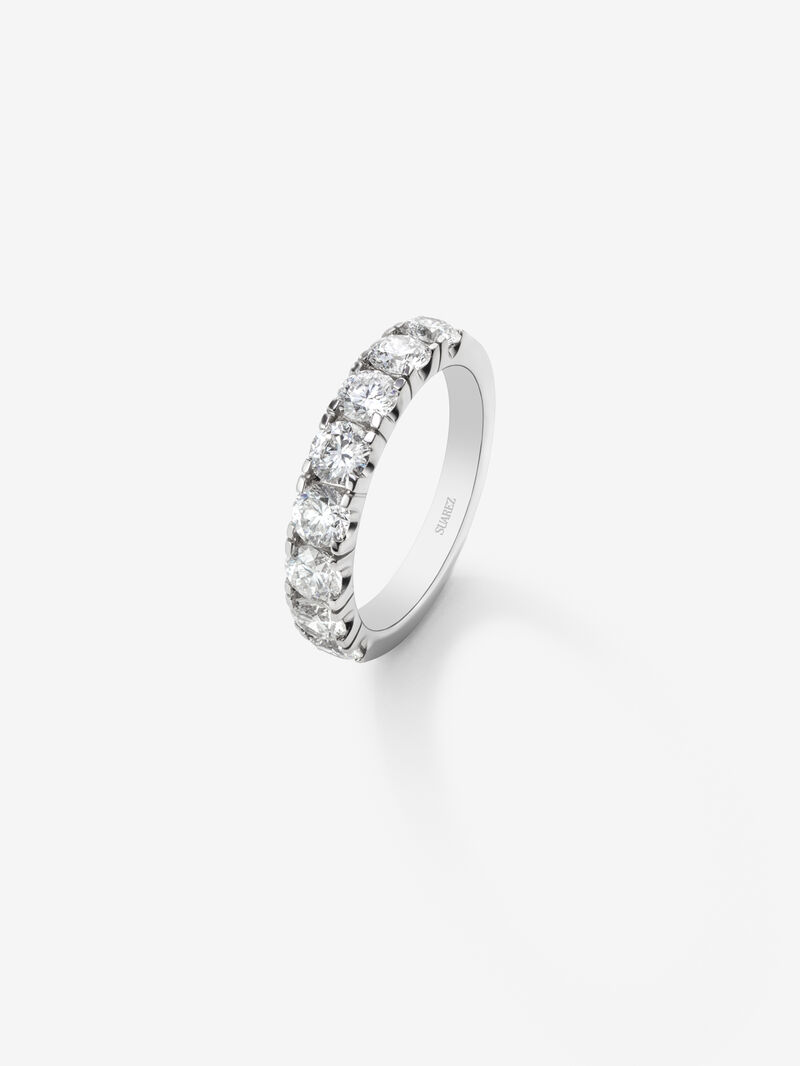 Half eternity engagement ring in 18K white gold with claw set diamonds. image number 0