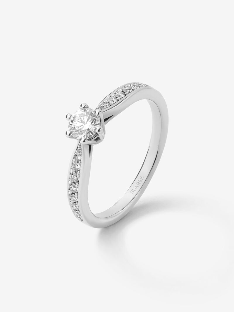 Solitaire ring in 18K white gold with a central 0.30-carat brilliant-cut diamond and additional diamonds totaling 0.15 cts image number 0