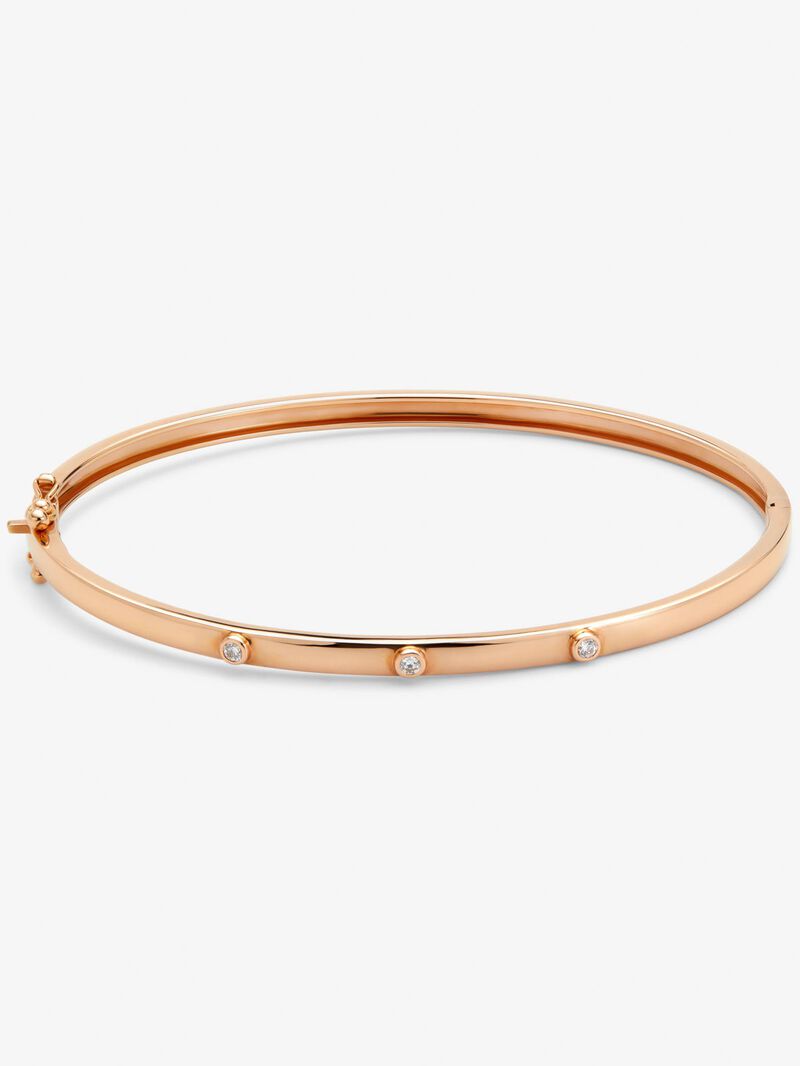 Thin rigid bracelet in 18K rose gold with diamonds. image number 1