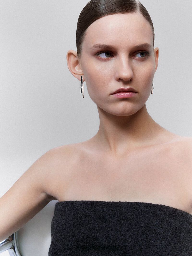 18K white gold pendant earrings with black diamond and white diamond. image number 1