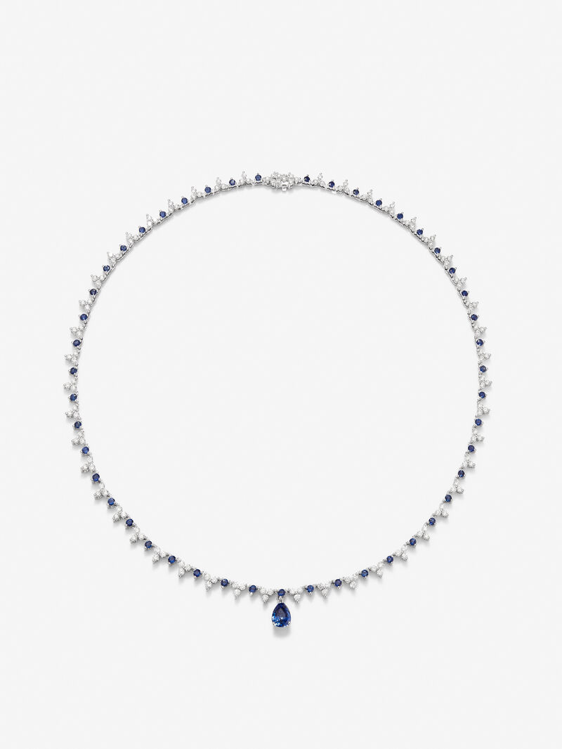 18K white gold necklace with Royal blue sapphire in 1.25 cts pear size, blue sapphires in 2.96 and white diamonds in bright size of 4.27 cts image number 0