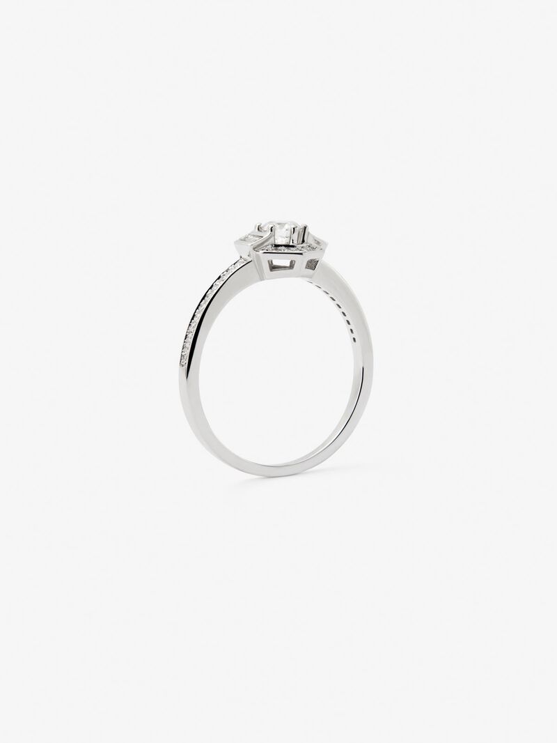 18K white gold ring with a 0.2 ct brilliant-cut central diamond; 2 in baguette cut with a total of 0.05 cts and 38 in brilliant cut with a total of 0.12 cts image number 4