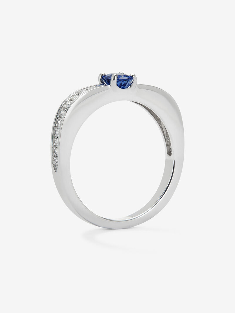 18K white gold ring with oval-cut blue sapphire of 0.44 cts and 22 brilliant-cut diamonds with a total of 0.16 cts image number 4