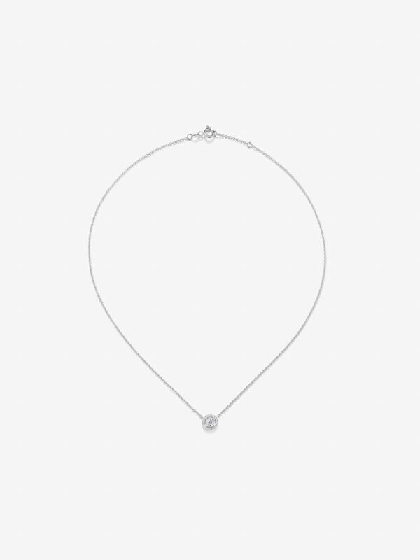 Colgante de oro blanco de 18kt con diamante central de 0,15cts y orla de diamantes, PT7007-00D015_V