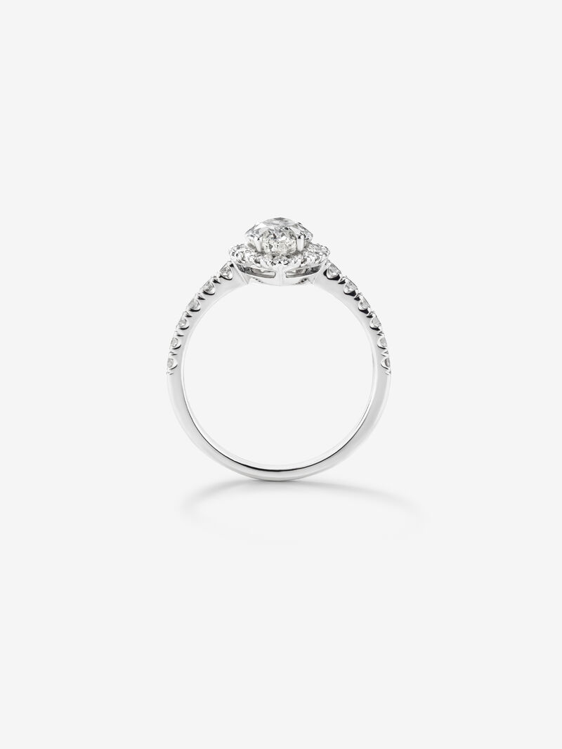 18K white gold solitaire ring with a halo of diamonds. image number 4