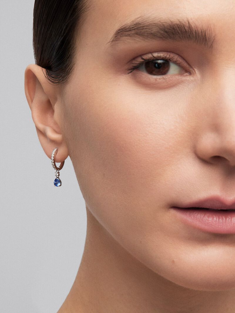 18K white gold hoop earrings with 2 pear-cut blue sapphires with a total of 0.77 cts and 28 brilliant-cut diamonds with a total of 0.3 cts image number 1