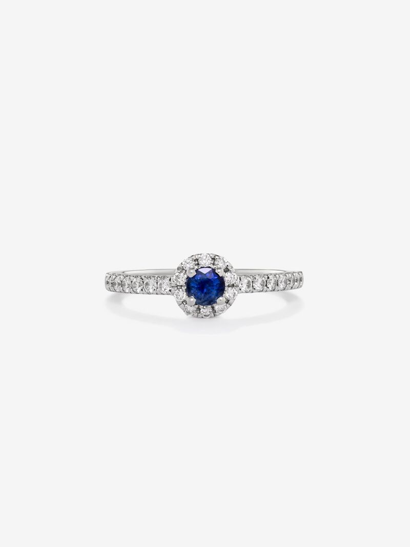 18K white gold ring with brilliant-cut blue sapphire of 0.4 cts and border and arm of 24 brilliant-cut diamonds with a total of 0.3 cts image number 1