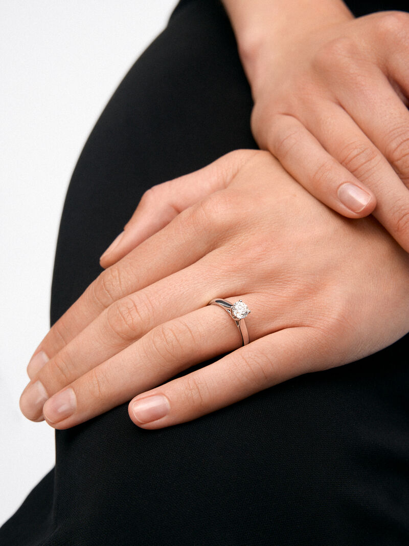 18K white gold solitaire ring with 0.7 ct brilliant cut diamond image number 1