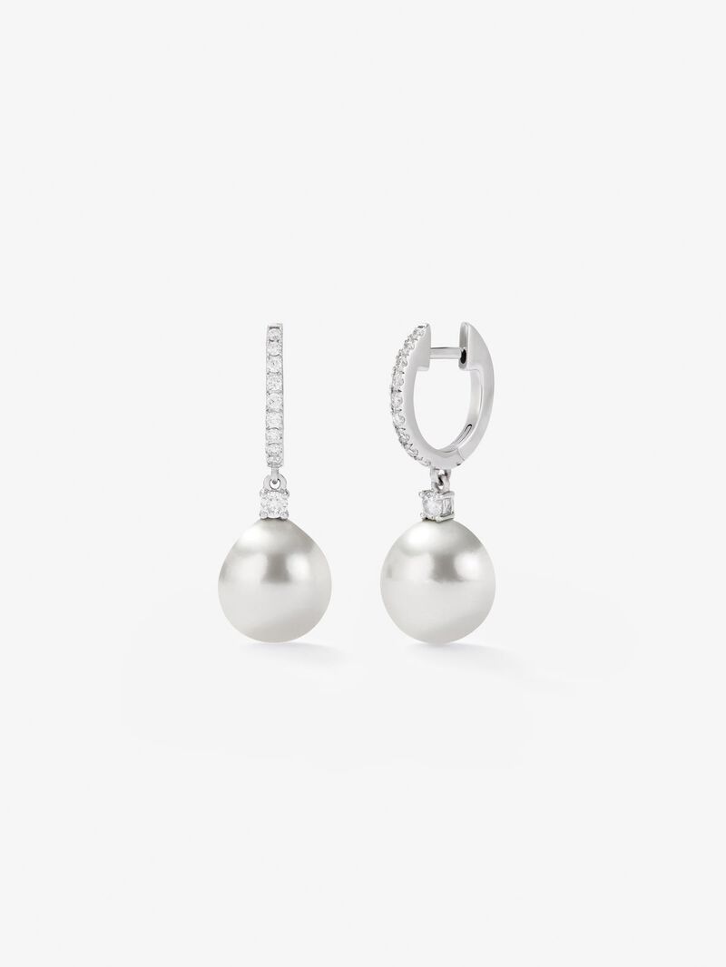 18K white gold earrings with 9 mm Australian pearls and diamonds in bright 0.31 cts image number 0