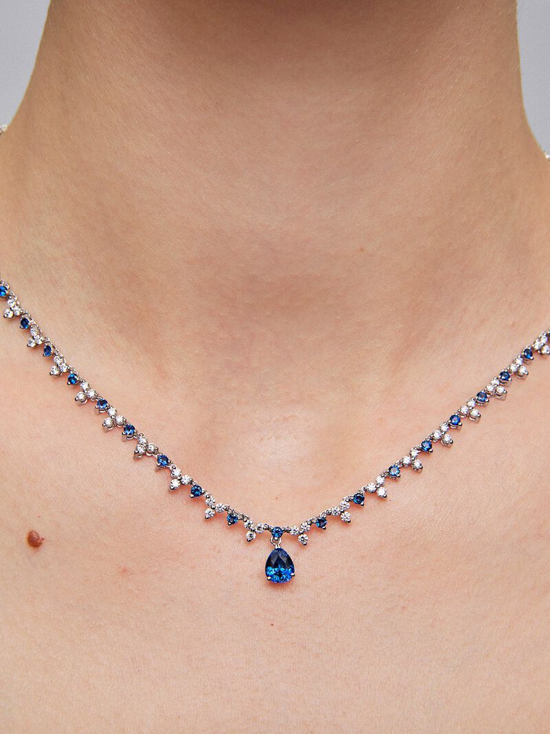18K white gold necklace with Royal blue sapphire in 1.25 cts pear size, blue sapphires in 2.96 and white diamonds in bright size of 4.27 cts image number 2